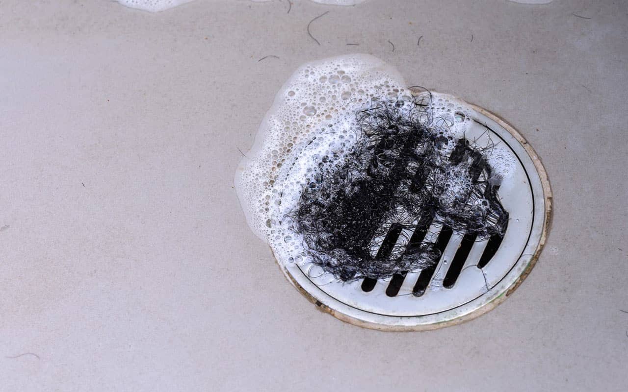 drain with hairs clogged