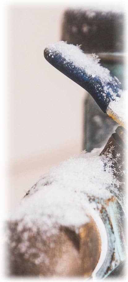pipe frozen in snow