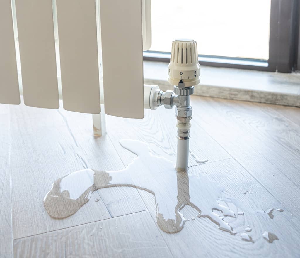water leak through the heating radiator tube nut