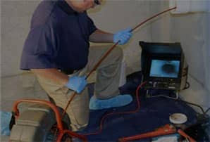 a man doing sewer camera inspection services